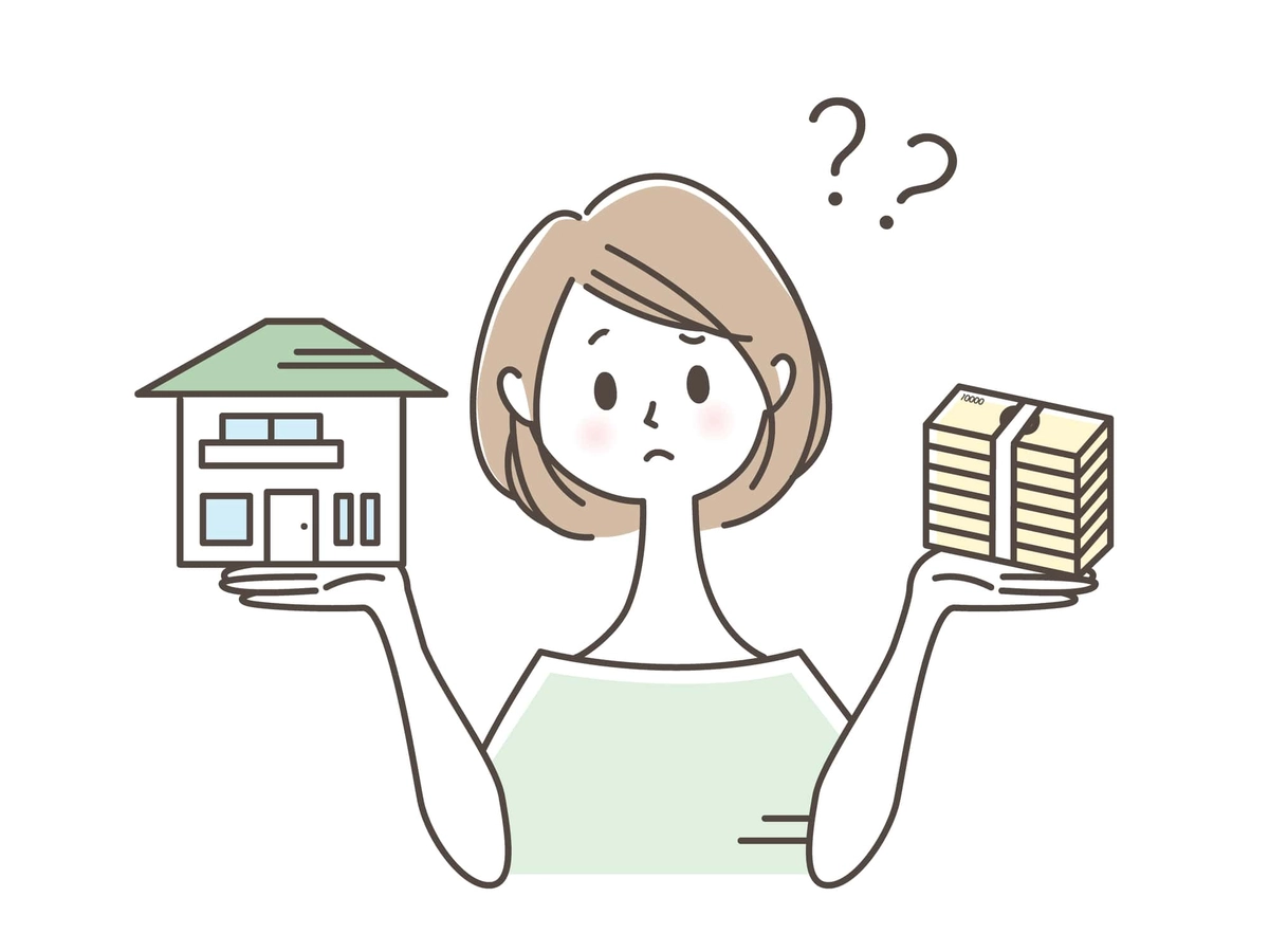 家とお金について悩む女性