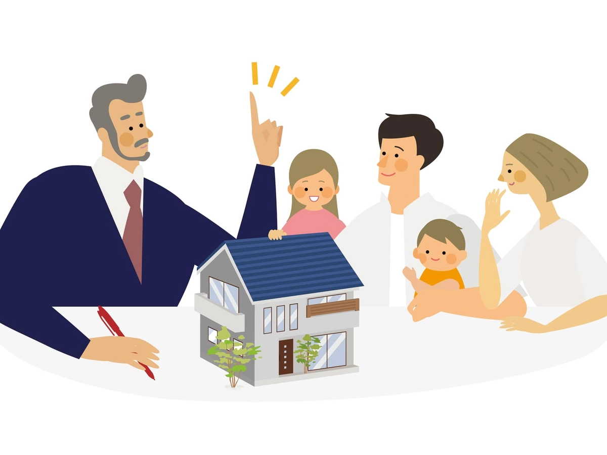 マイホーム計画をする家族と提案するスーツの男性