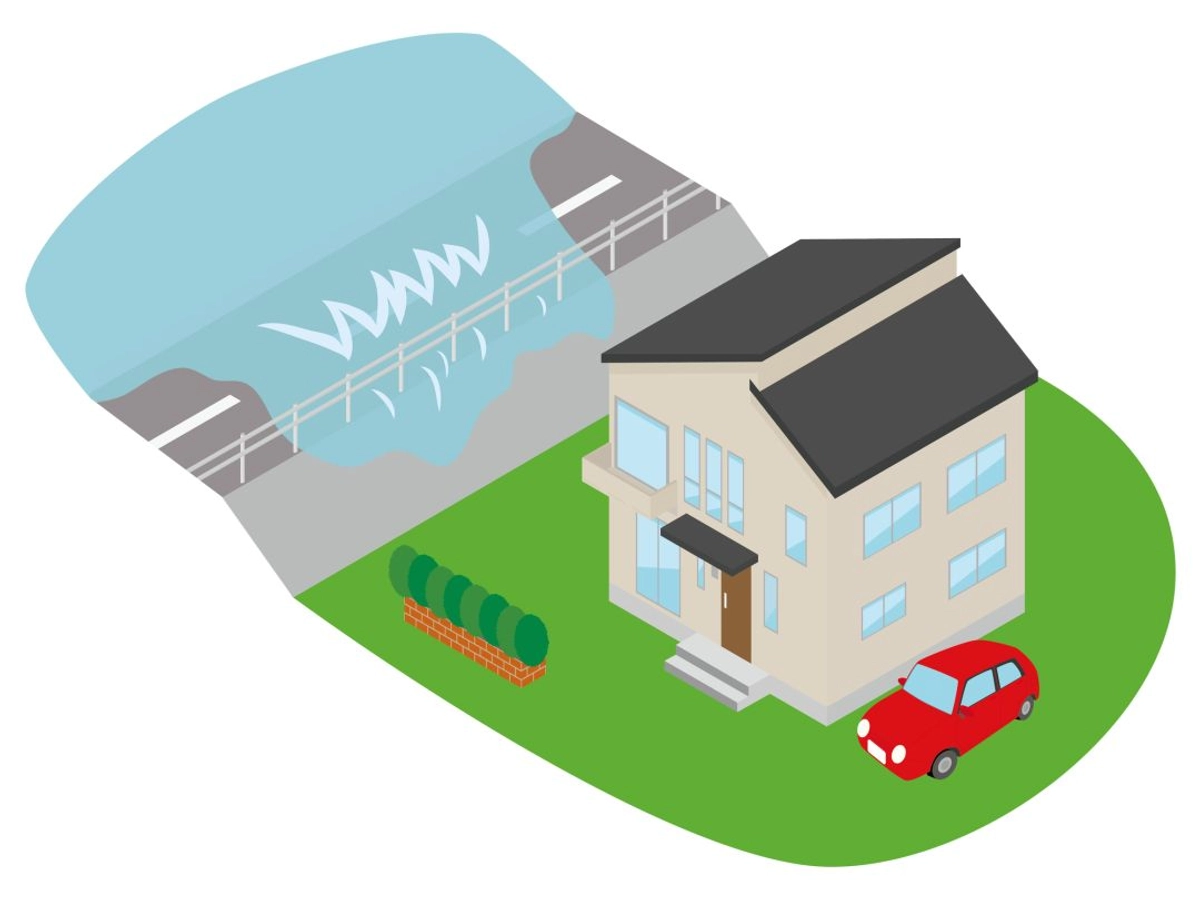 そばの河の水が越水している住宅
