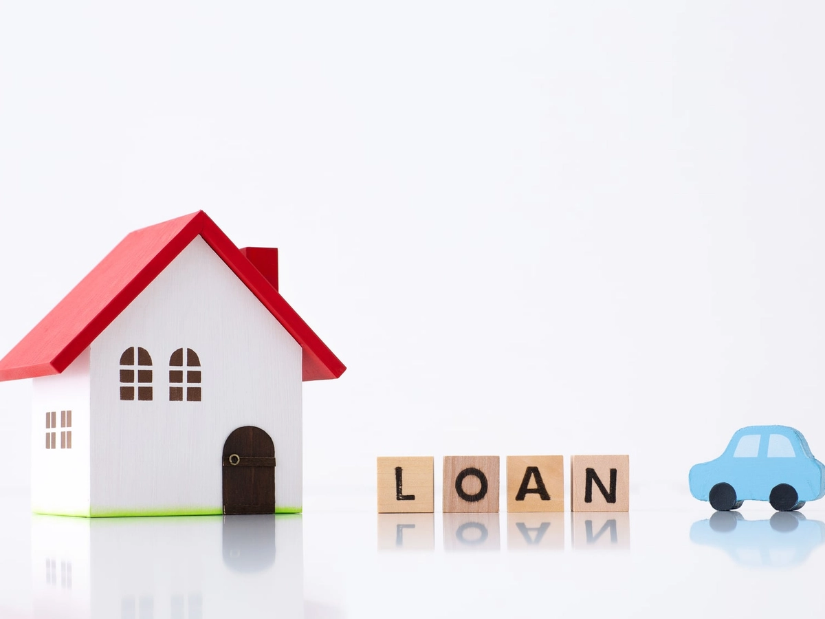 住宅ローンと書かれたブロックと家