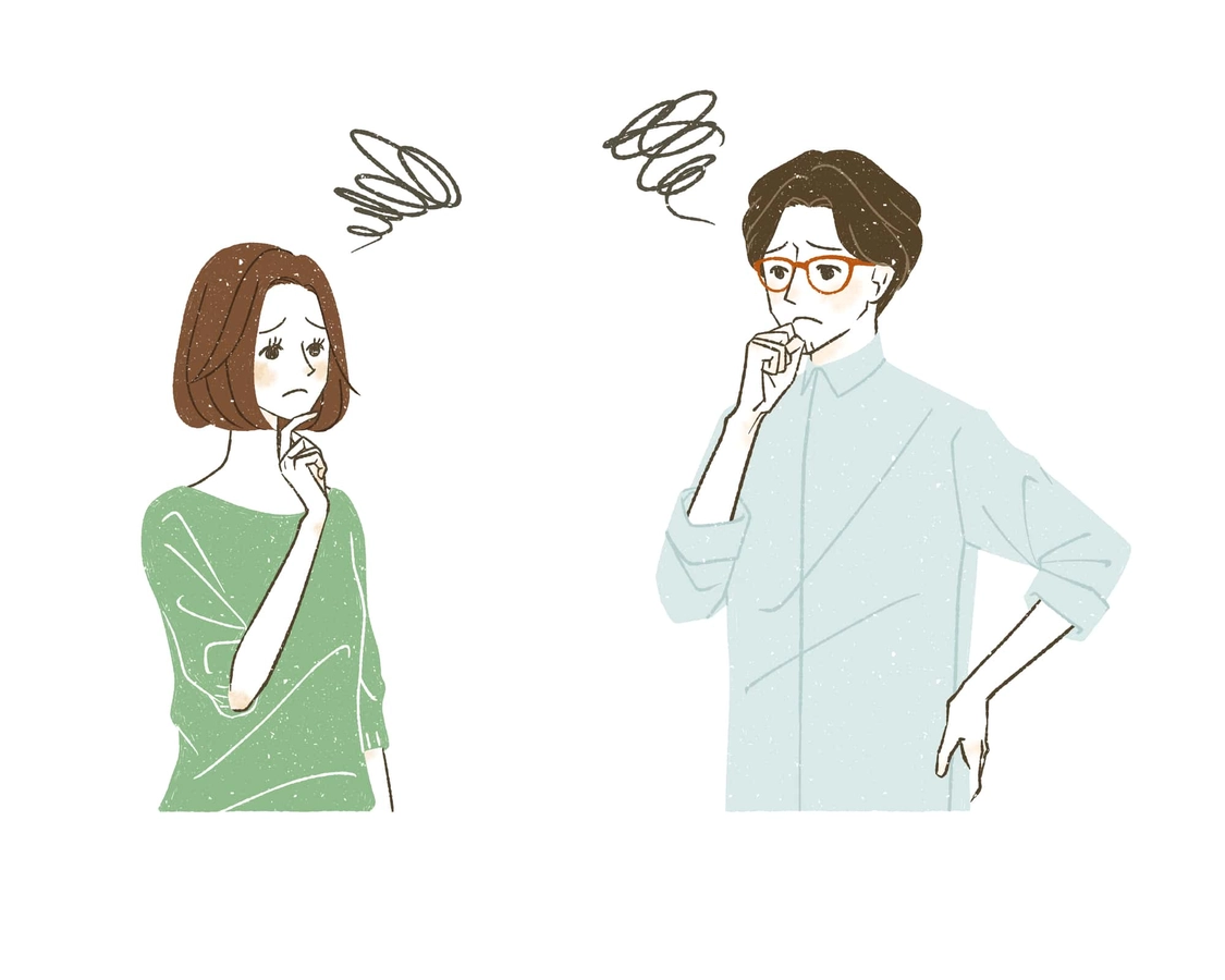 後悔し悩んでいる男女