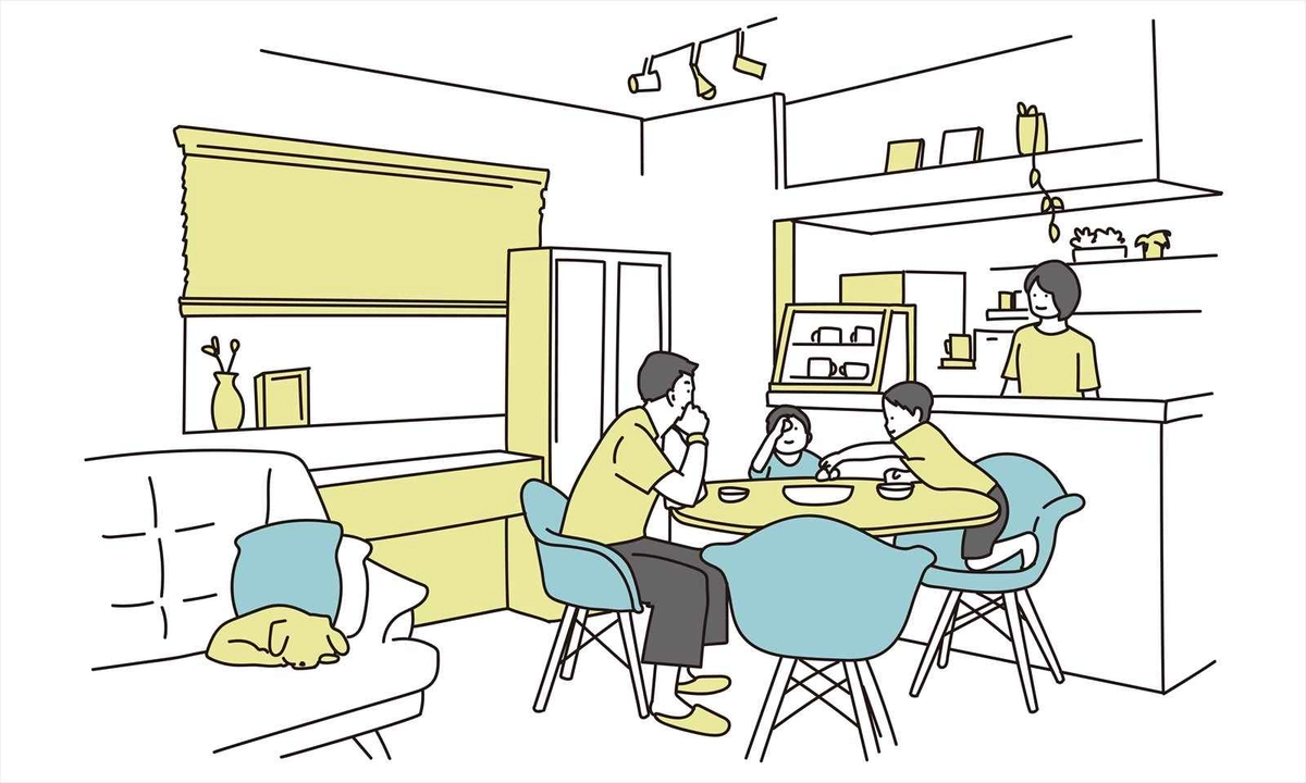 室内で家族団らんを楽しむ家族