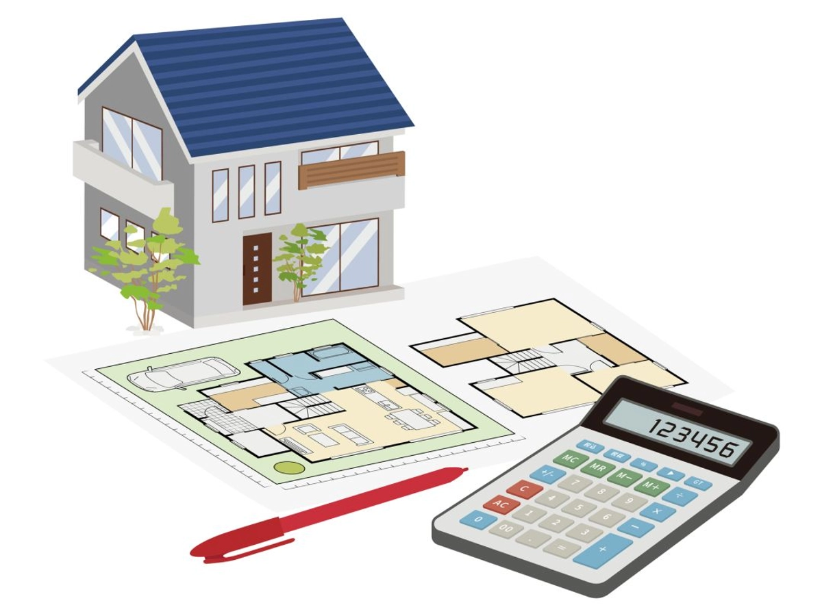 マイホームの間取り図と電卓と赤ペン
