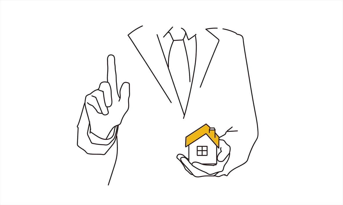 家の模型を使って説明をするビジネスマン