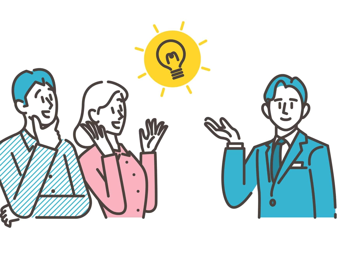 夫婦の相談に答える男性営業マン