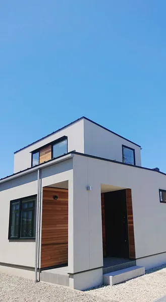 グラデーションのようになだらかな距離感の住まいの外観